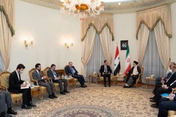 السيد رئيسي لدى استقباله الرئيس الاسد في طهران