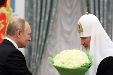 بوتين يهنئ بطريرك روسيا بعيد ميلاده